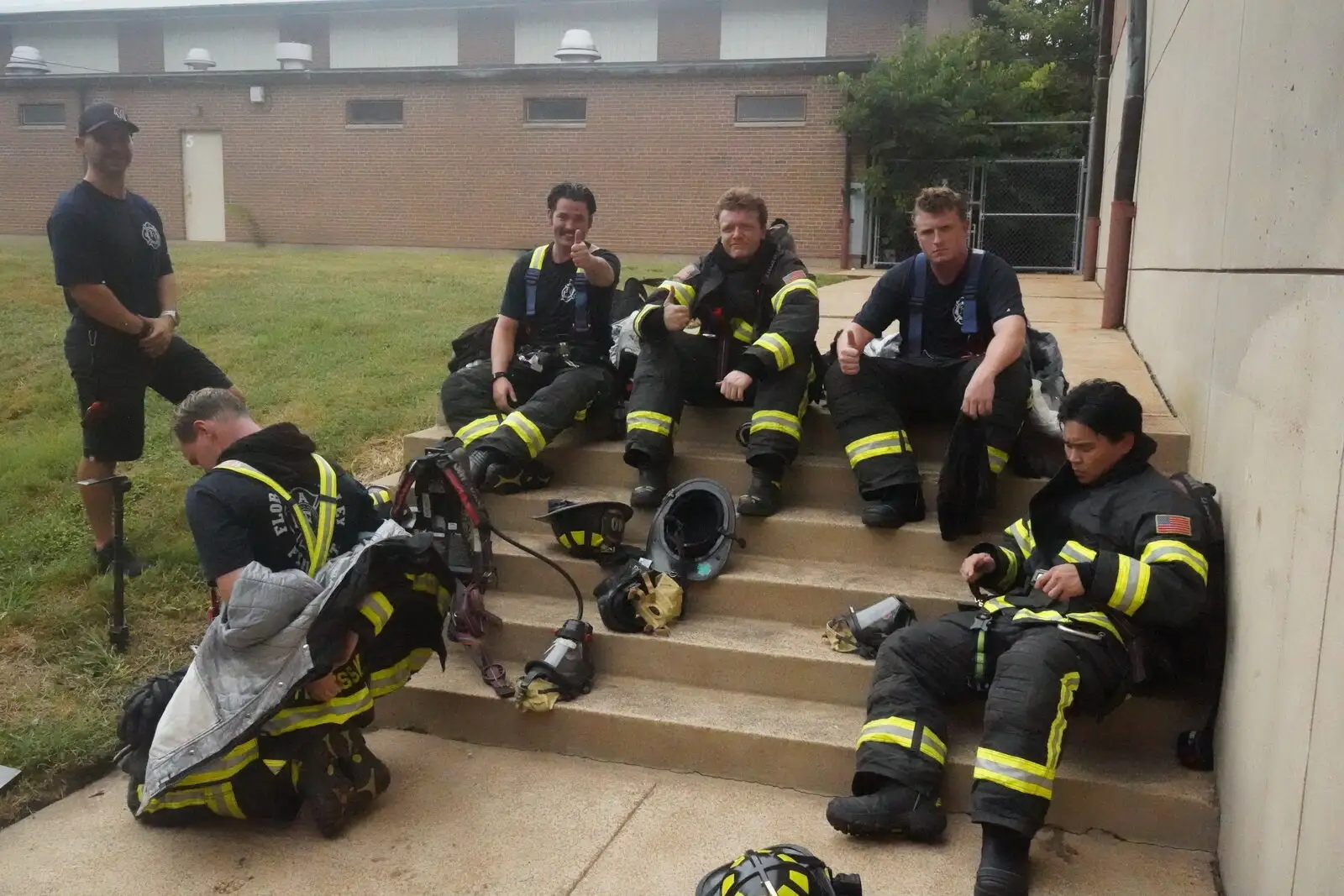 A crew rests together with their gear after a training evolution
