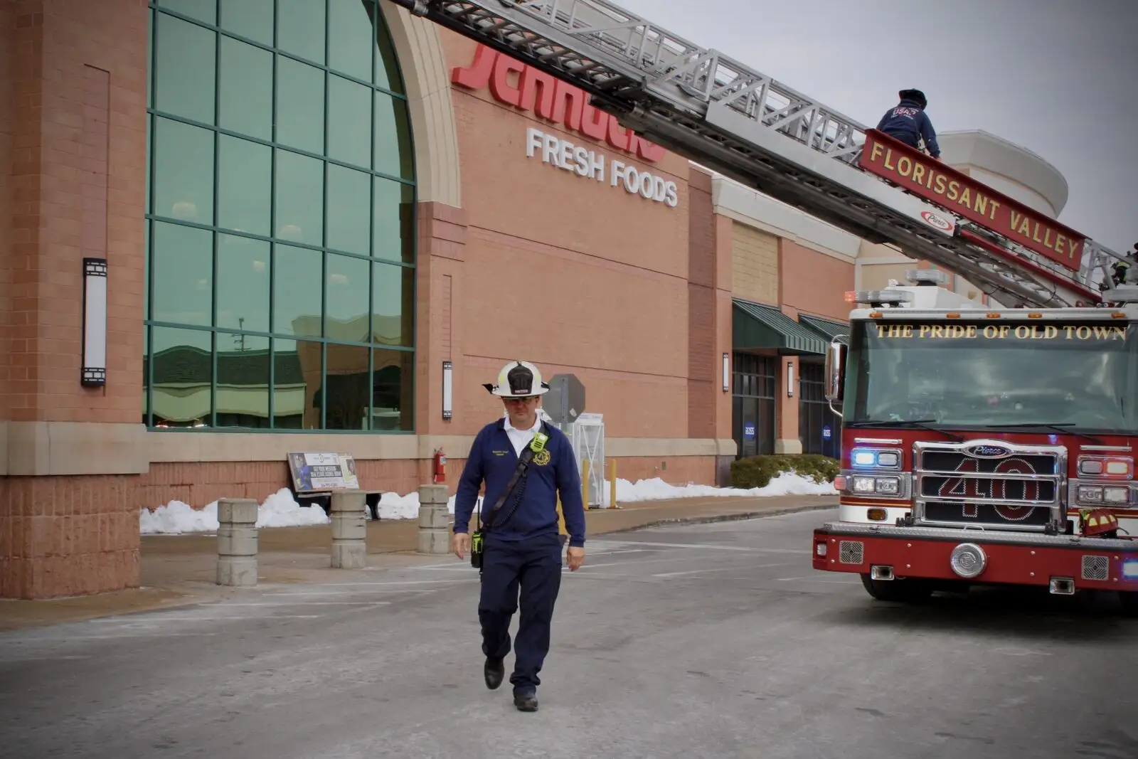 The fire marshal at a commercial fire scene