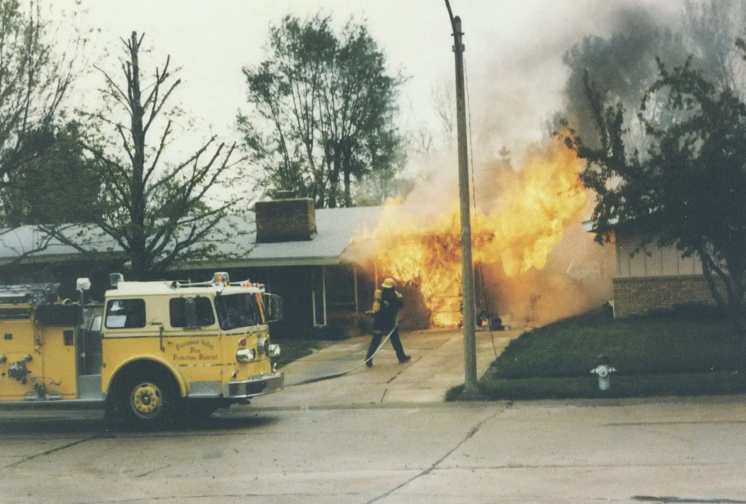 Florissant Valley firefighters at an early fire scene