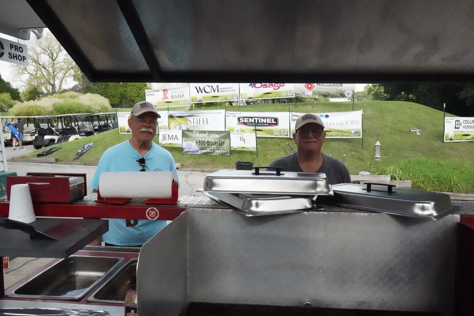 Volunteers grilling at the annual FFCO golf tournament
