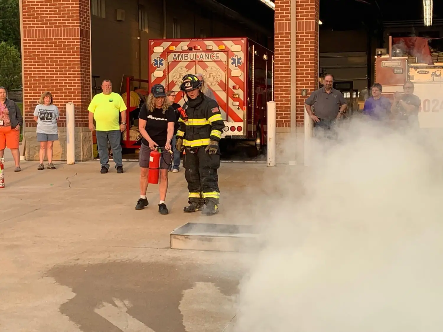 Firefighters leading hands-on fire-suppression training