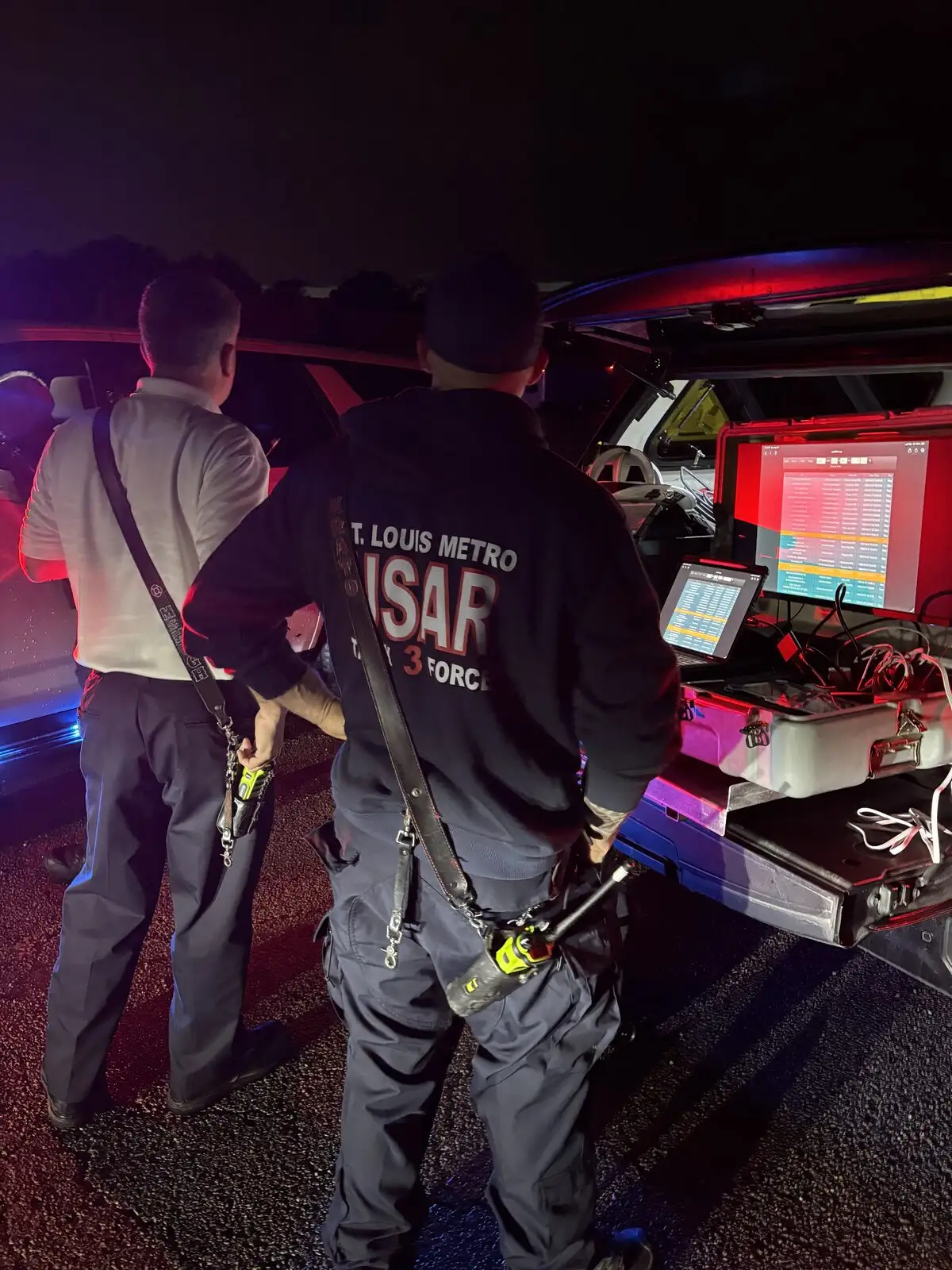 USAR task force members working equipment during night operations