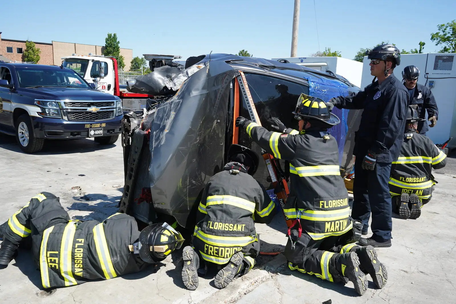 Firefighters perform a vehicle extrication during training